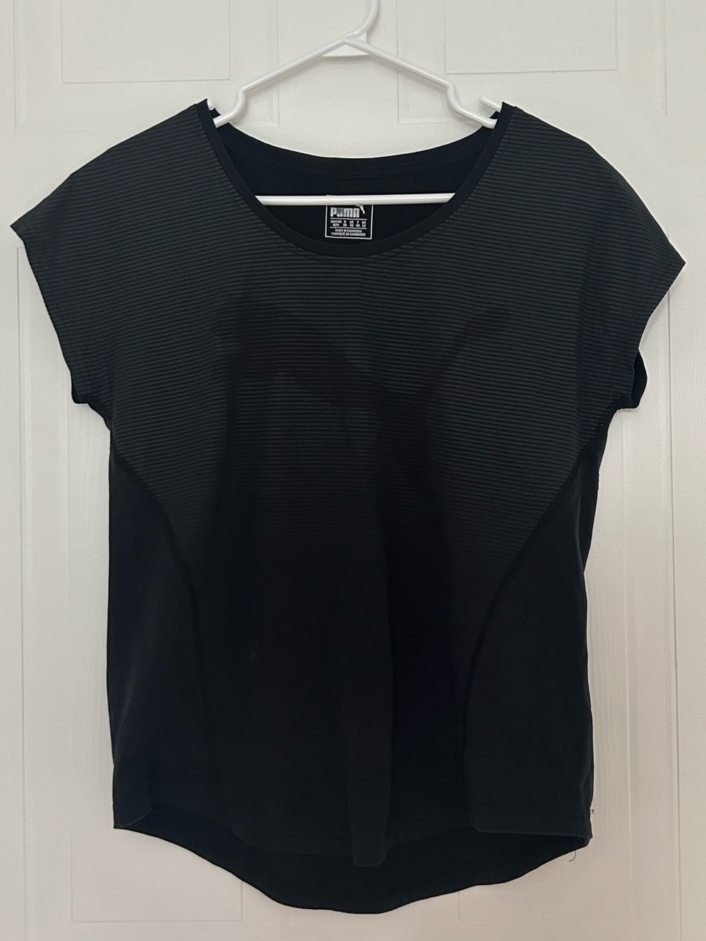 Puma Women’s Black Short-Sleeve Athletic Tee with Subtle Stripe Panel - W Size M